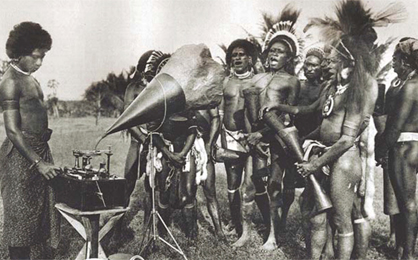 Baifa men singing into the phonograph. Photo taken during the recording of phonogram 524 by Rudolph Pöch, Cape Nelson, 12 November 1905